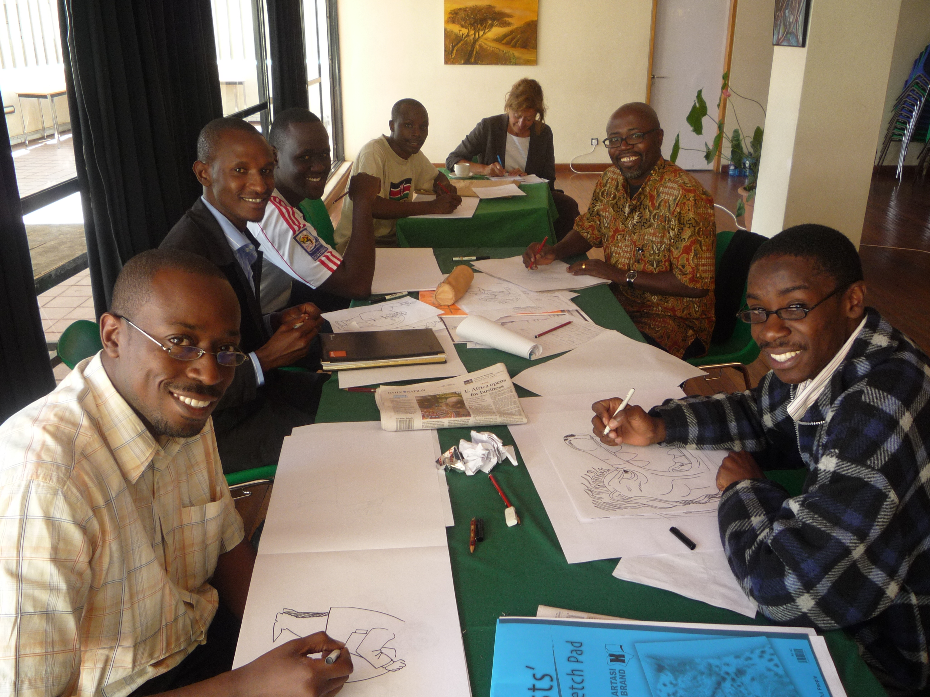 Les dessinateurs se mettent au travail. But de l’atelier: créer des clips vidéo basés sur des dessins originaux. En trois jours! – Nairobi, 19 janvier 2010   Les dessinateurs se mettent au travail. But de l’atelier: créer des clips vidéo basés sur des dessins originaux. En trois jours! – Nairobi, 19 janvier 2010